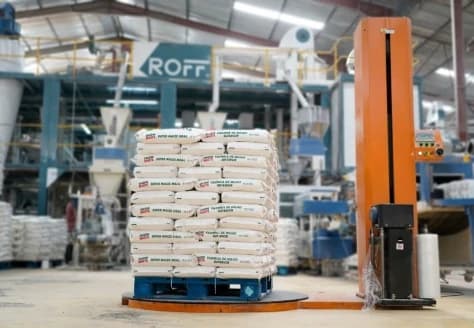 Pallet of flour bags being stretch-wrapped at a mill